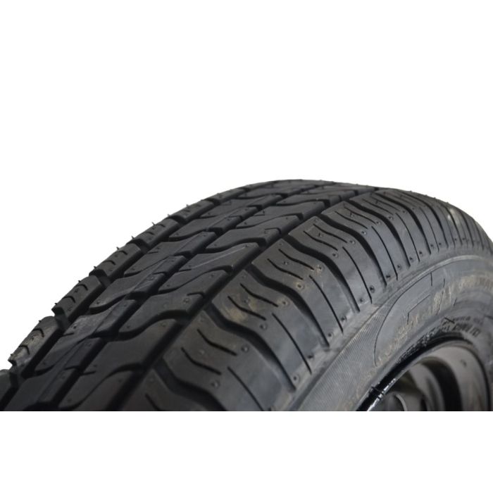 Tire on black rim 145/70R13 67/112/5/30 84N